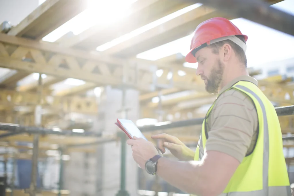 construction manager using GAMMA AR on construction site